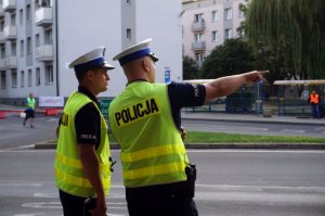 Dwóch policjantów ruchu drogowego KPP Mikołów w trakcie zabezpieczenia wyścigu w dniu 06.09.2019 r.