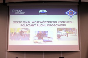 Na zdjęciu slajd i napis o treści XXXIV Finał Wojewódzkiego Konkursu Policjant Ruchu Drogowego