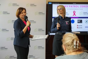 zdjęcie przedstawia: lektora wraz z policjantką.