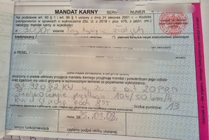 na zdjęciu mandat karny na kwotę 3 tysięcy złotych