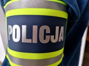 Opaska z napisem policja