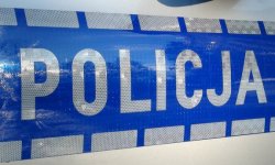 Zdjęcie przedstawia napis o treści &quot;Policja&quot;