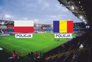 zdjęciu stadionu piłkarskiego z widoku z trybun, na pierwszym planie flaga polski i rumunii