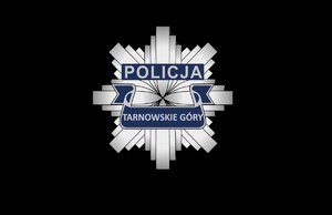 logo tarnogórskiej policji na czarnym tle